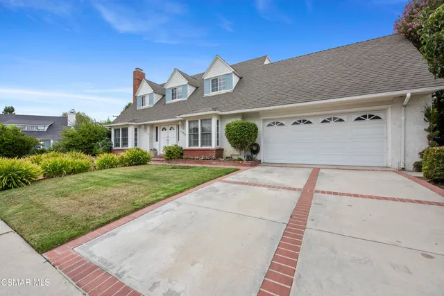 a front view of house with yard