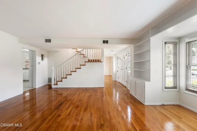 a view of entryway with wooden floor