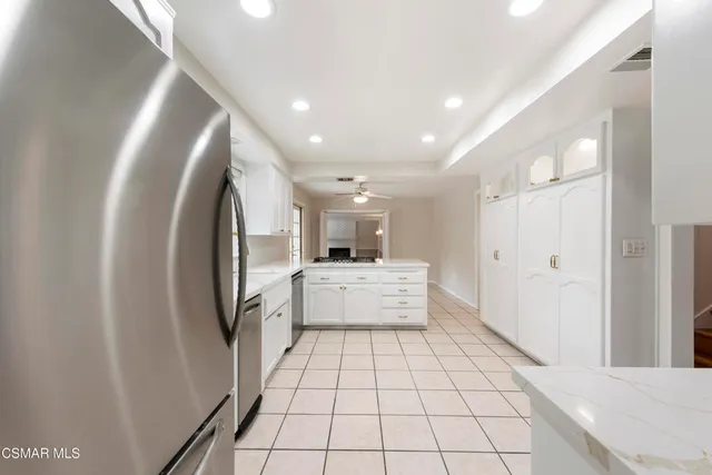 a bathroom with a double vanity sink and mirror