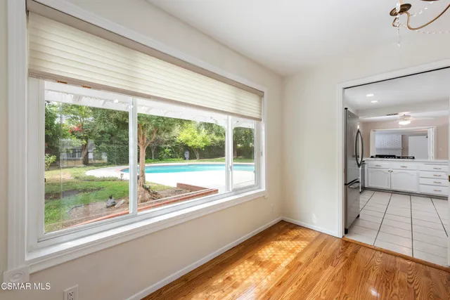 a view of hallway with a large window