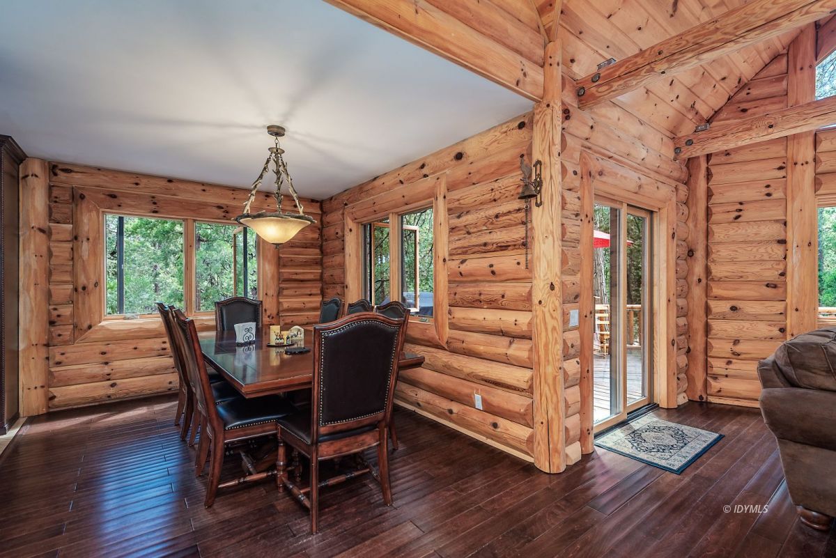 25117 Fern Valley Road Idyllwild, CA 92549 - Photo 22 of 67 a view of a dining room with furniture window and wooden floor