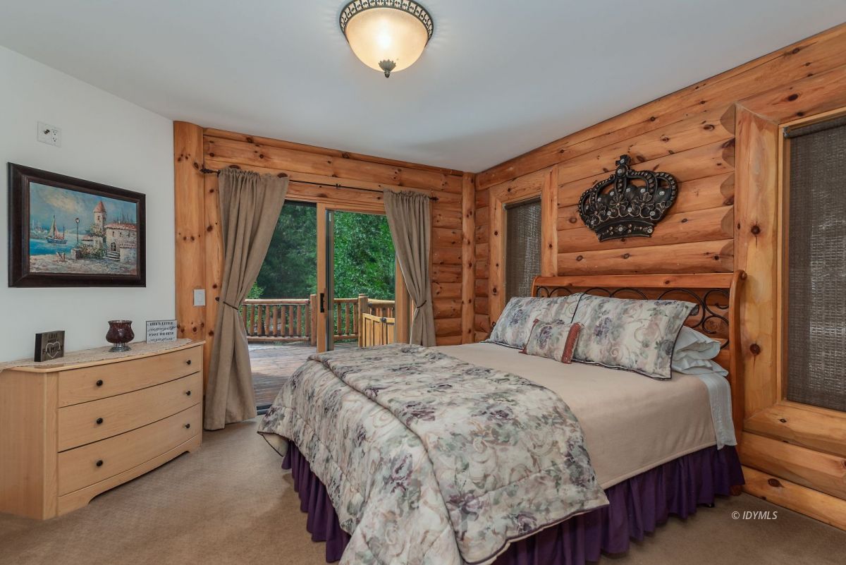 25117 Fern Valley Road Idyllwild, CA 92549 - Photo 29 of 67 a bedroom with a bed and a window