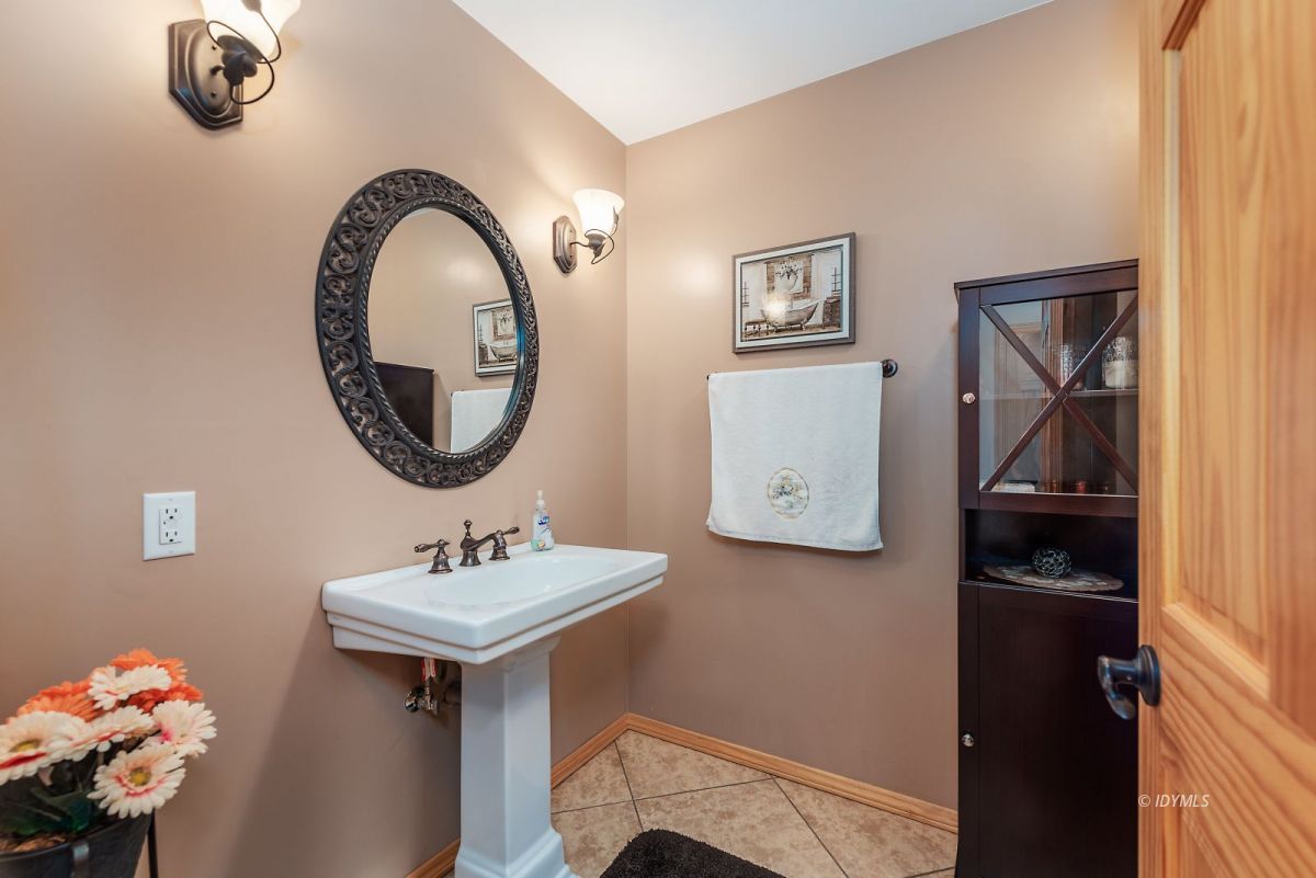25117 Fern Valley Road Idyllwild, CA 92549 - Photo 32 of 67 a bathroom with a sink and a mirror