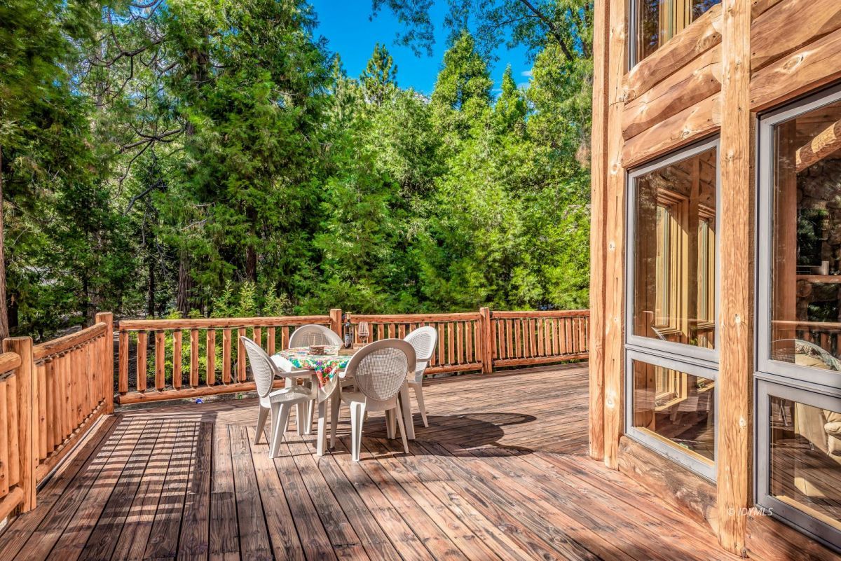 25117 Fern Valley Road Idyllwild, CA 92549 - Photo 50 of 67 a view of balcony with wooden floor and seating space