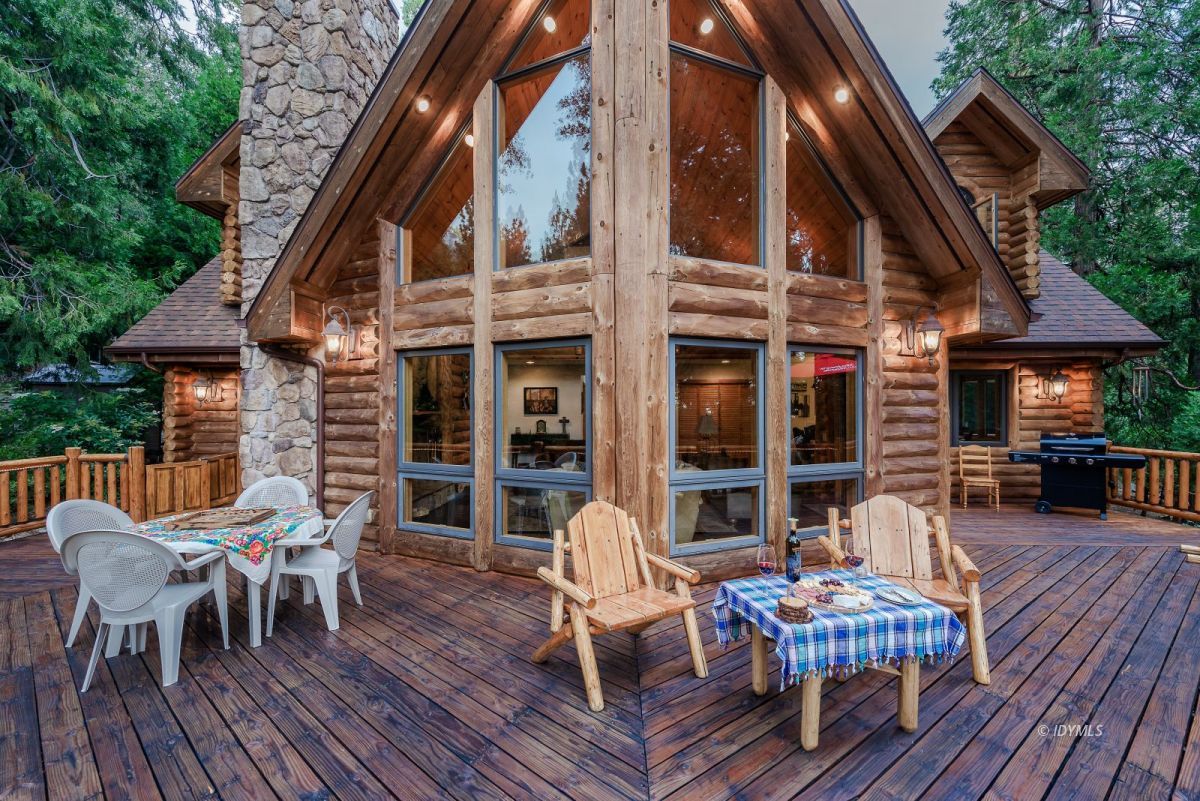 25117 Fern Valley Road Idyllwild, CA 92549 - Photo 53 of 67 a view of a house with a deck and furniture