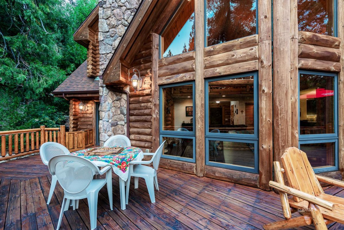 25117 Fern Valley Road Idyllwild, CA 92549 - Photo 55 of 67 a view of a chairs and table in the balcony