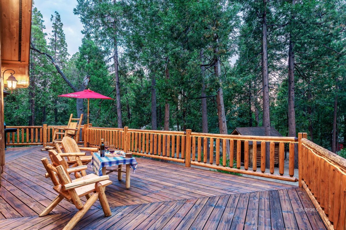 25117 Fern Valley Road Idyllwild, CA 92549 - Photo 63 of 67 a view of balcony with wooden floor and outdoor seating