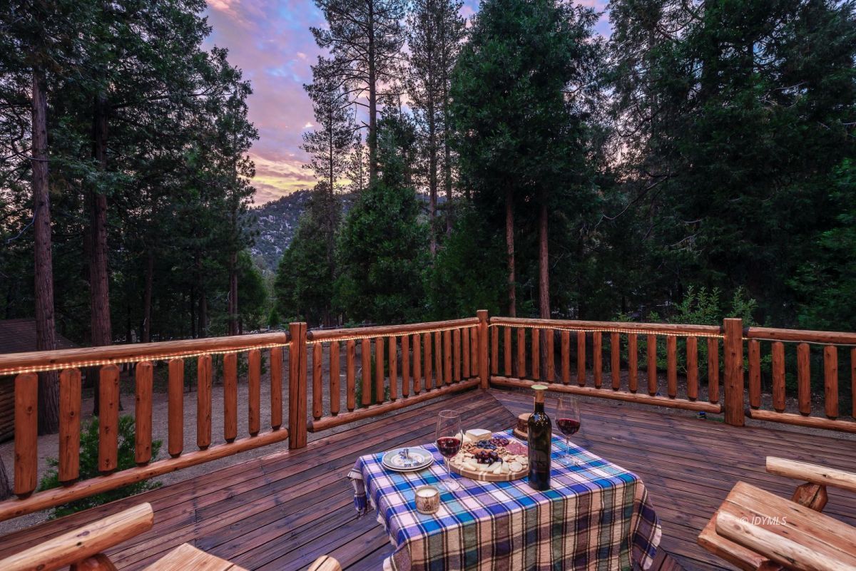 25117 Fern Valley Road Idyllwild, CA 92549 - Photo 64 of 67 a view of a wooden deck with a bench