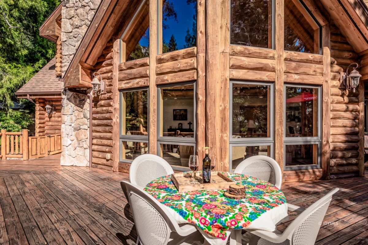 25117 Fern Valley Road Idyllwild, CA 92549 - Photo 9 of 67 front view of a house with a patio