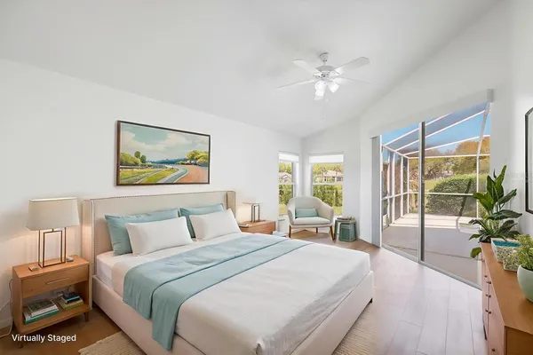 a bathroom with a tub sink shower and mirror