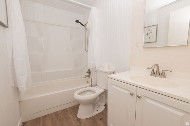 570 West Main Street Beaver, UT 84713 - Photo 16 of 43 Bathroom featuring a white vanity with integrated sink, brushed nickel faucet, and a large wall-mounted mirror