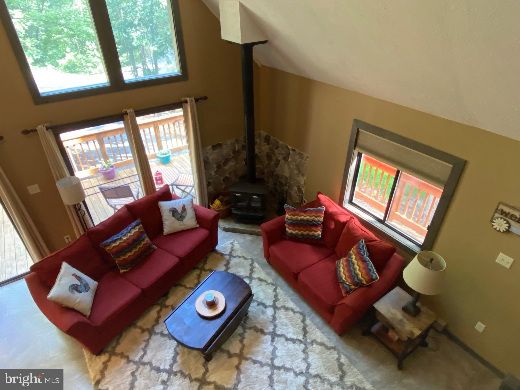 267 Susan Road Basye, VA 22842 - Photo 30 of 84 a living room with furniture and a window