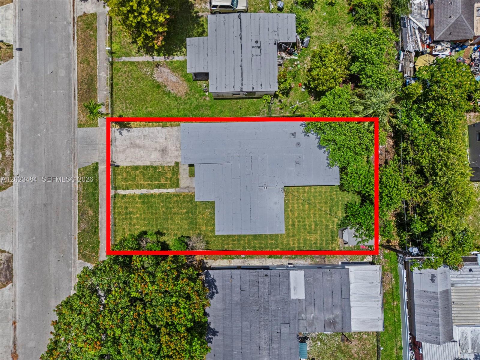 1961 Rutland Street Opa-Locka, FL 33054 - Photo 27 of 33 a small pool that is sitting in front of a house