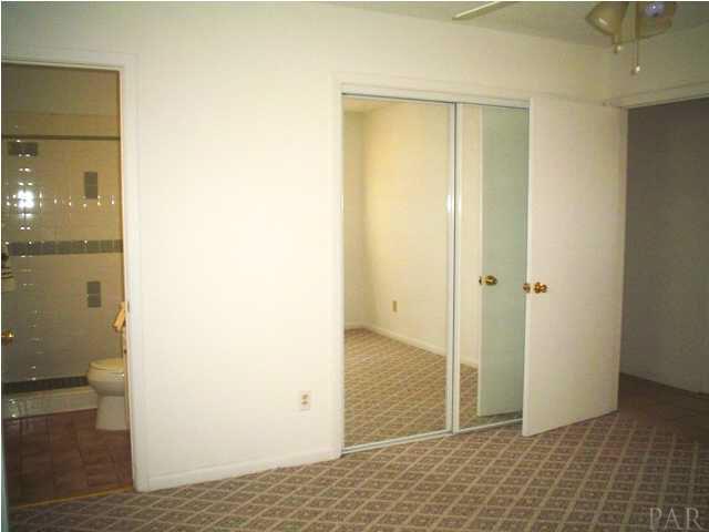 4521 Creighton Road Pensacola, FL 32504 - Photo 10 of 24 New mirrored closet doors in master bedroom.