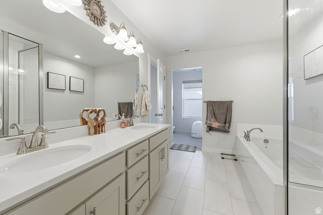 1038 South Old Towne Road Layton, UT 84041 - Photo 17 of 39 Double vanity with light cabinetry and white countertops