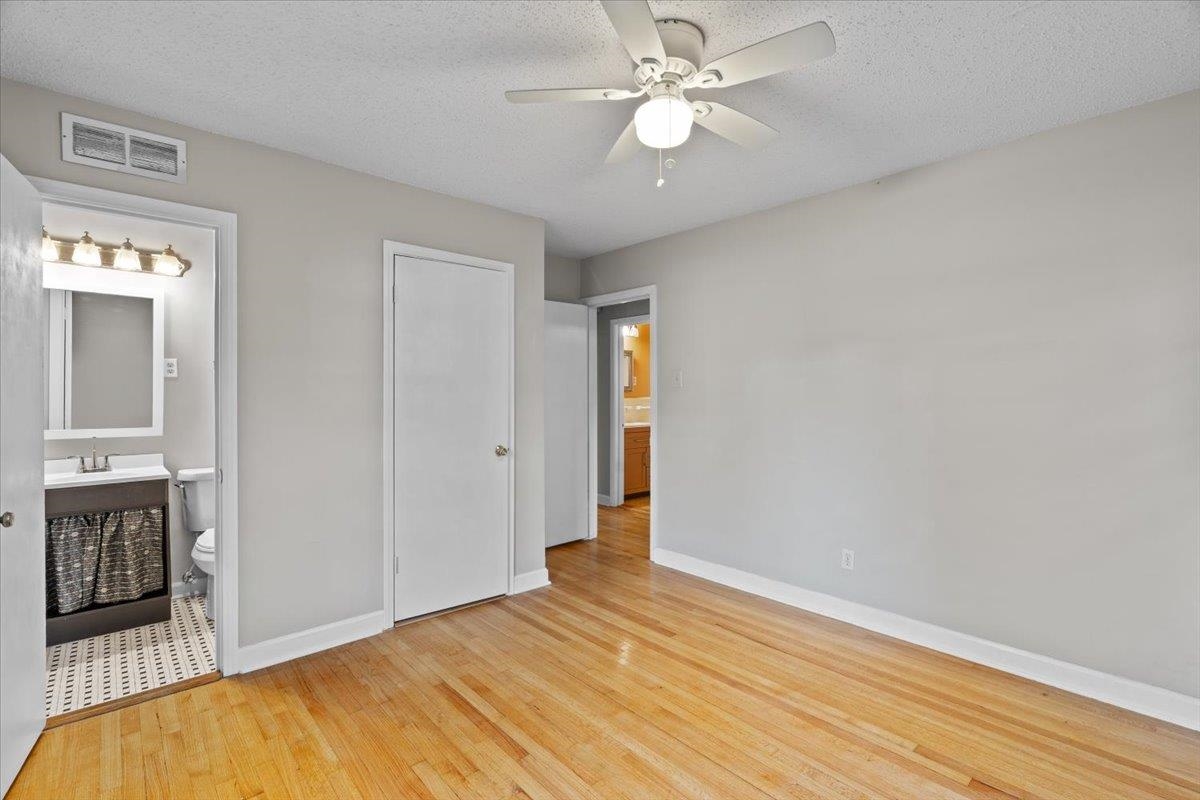 1495 Whitewater Road Memphis, TN 38117 - Photo 14 of 27 a view of empty room with wooden floor