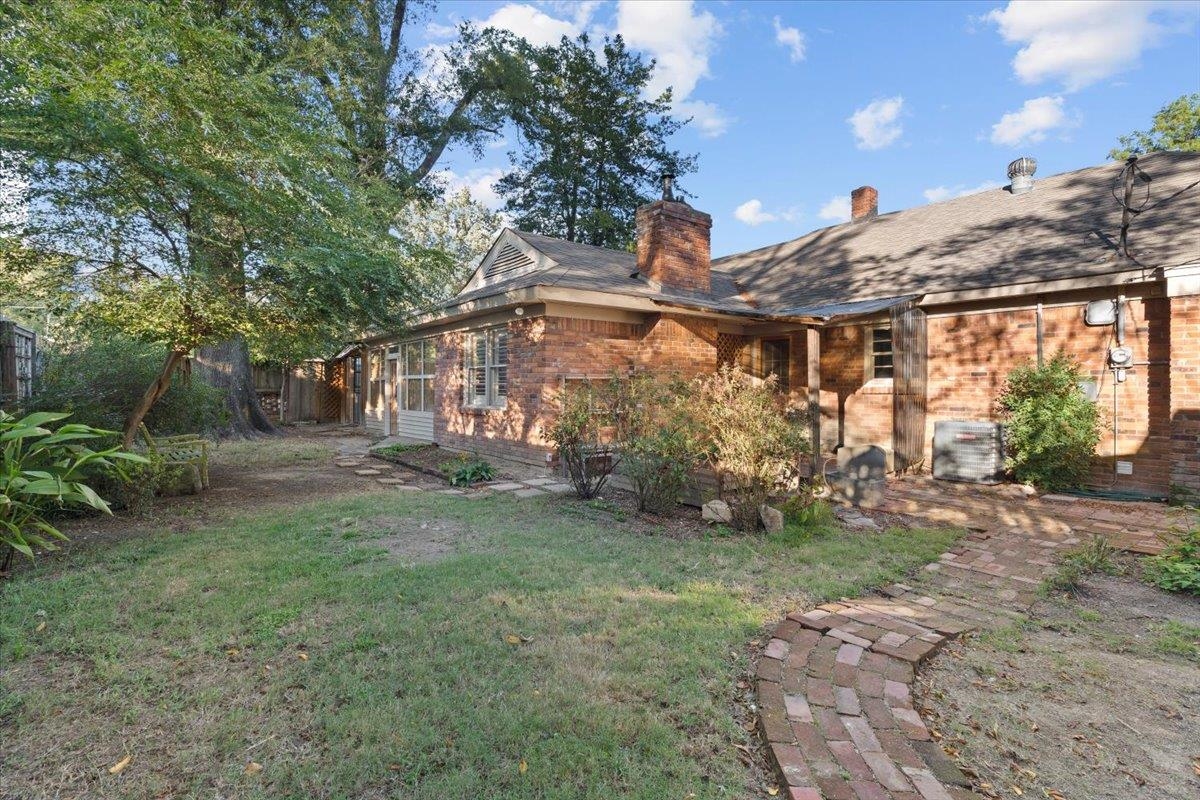 1495 Whitewater Road Memphis, TN 38117 - Photo 23 of 27 a view of a house with a yard