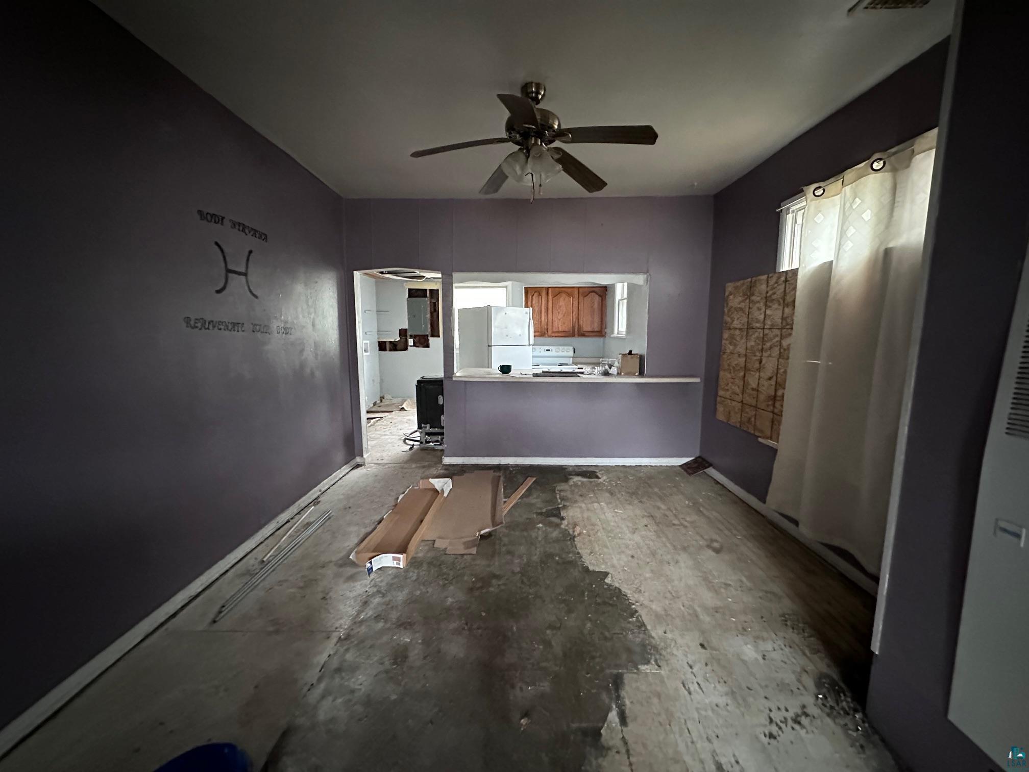 1314-1316 North 11th Street Superior, WI 54880 - Photo 7 of 21 Interior space featuring baseboards and a ceiling fan