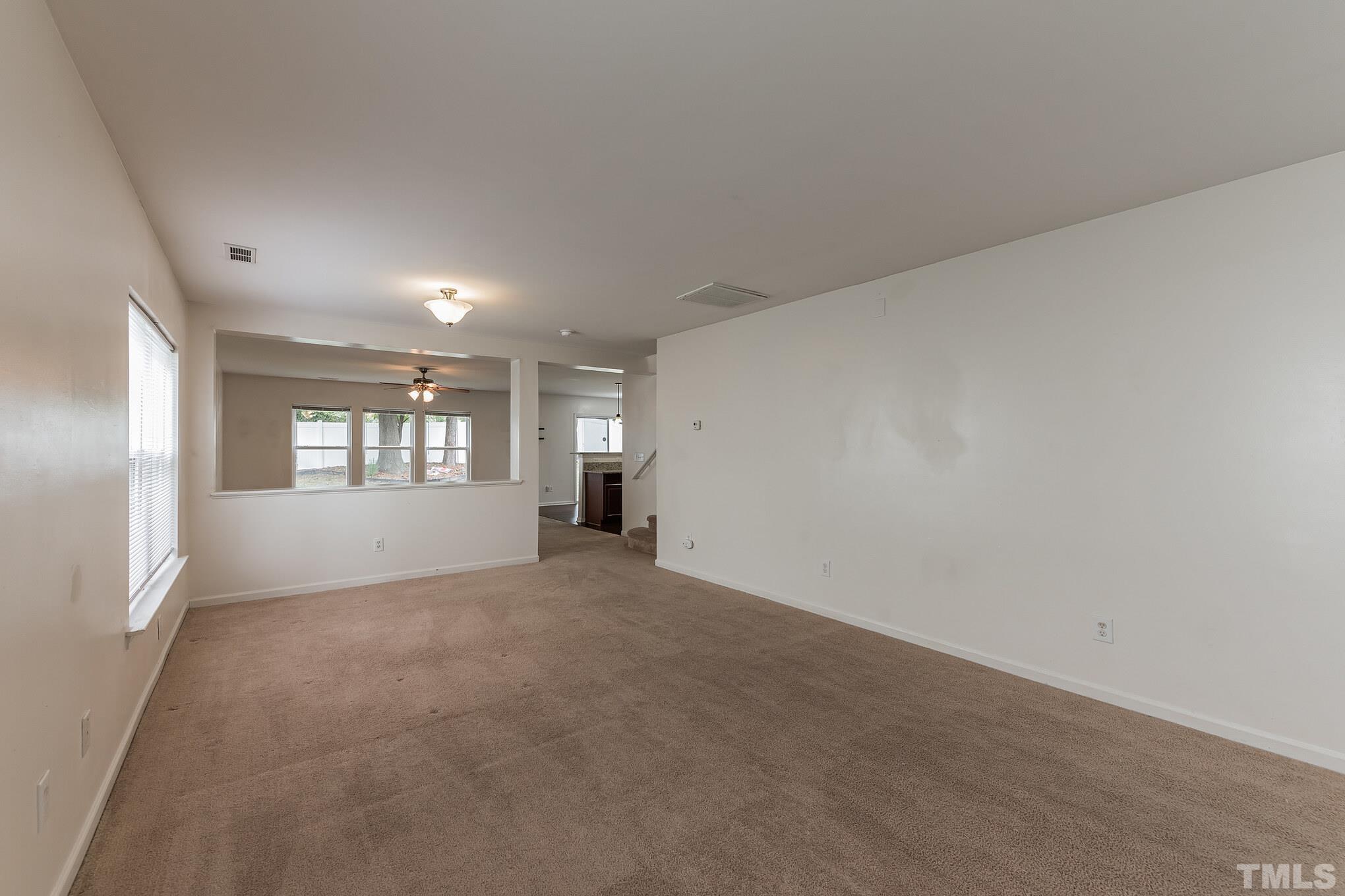 2824 Roundleaf Court Raleigh, NC 27604 - Photo 15 of 35 an empty room with windows and closet