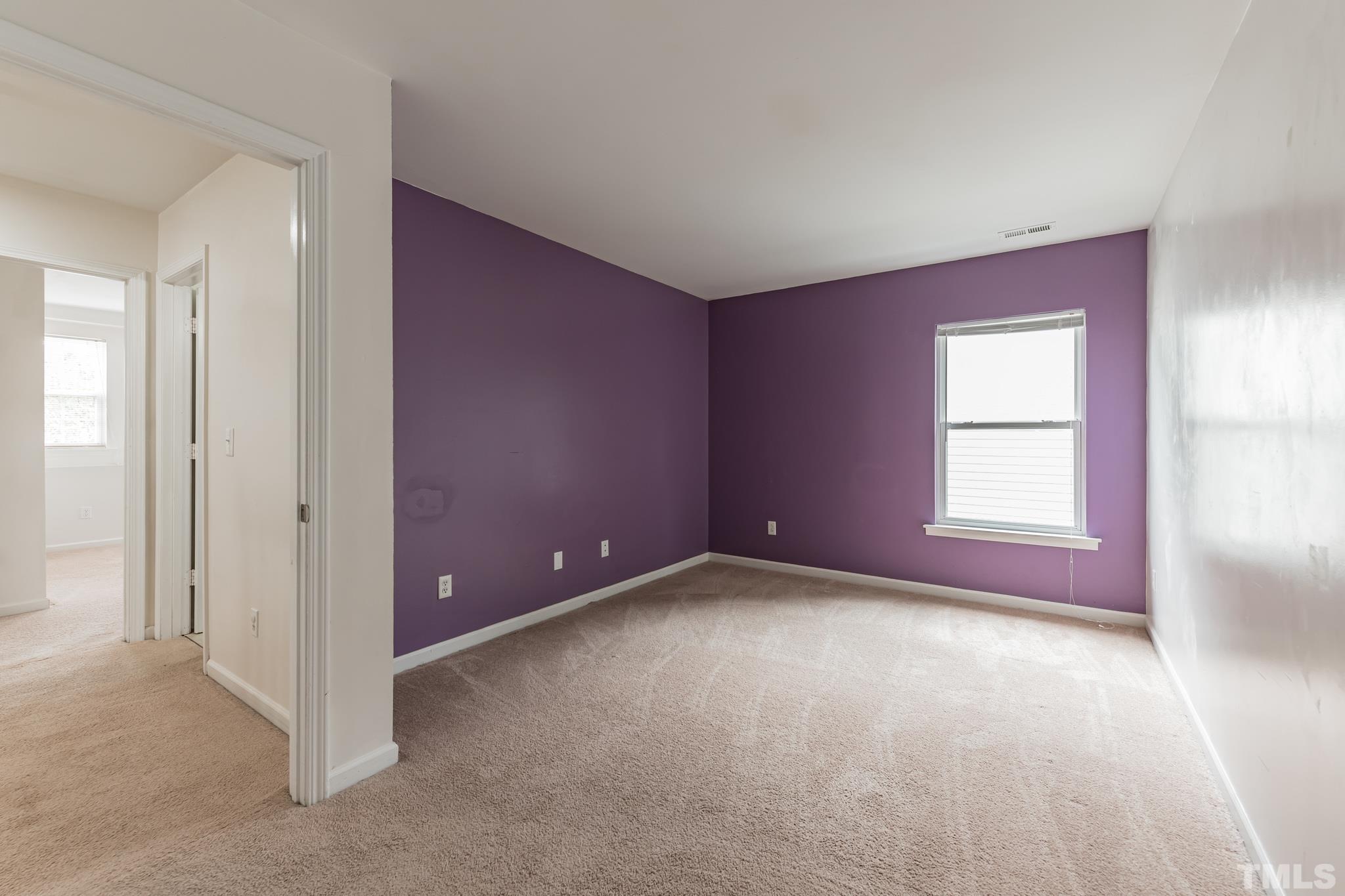2824 Roundleaf Court Raleigh, NC 27604 - Photo 18 of 35 a view of an empty room with a window
