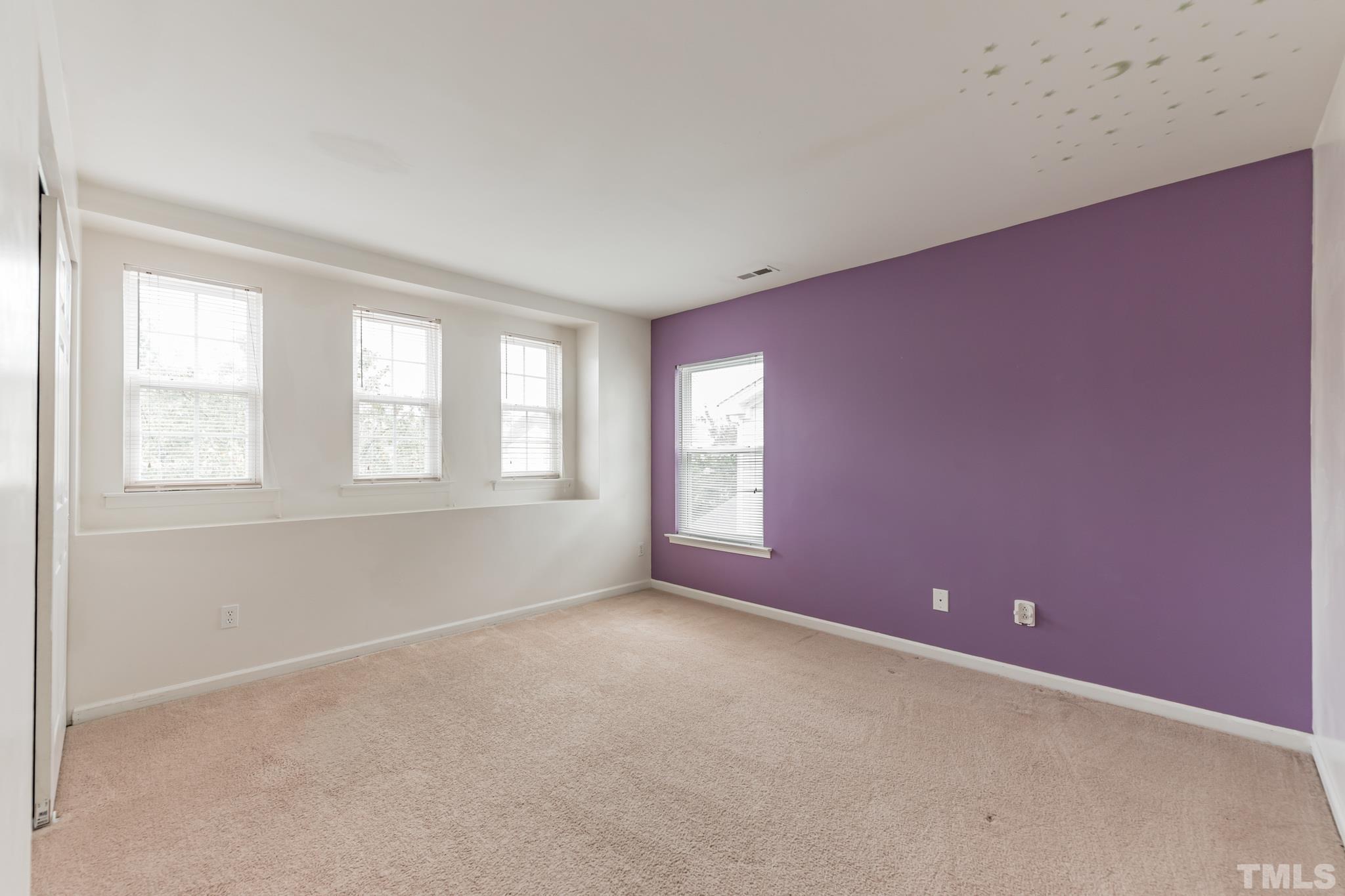 2824 Roundleaf Court Raleigh, NC 27604 - Photo 19 of 35 an empty room with windows