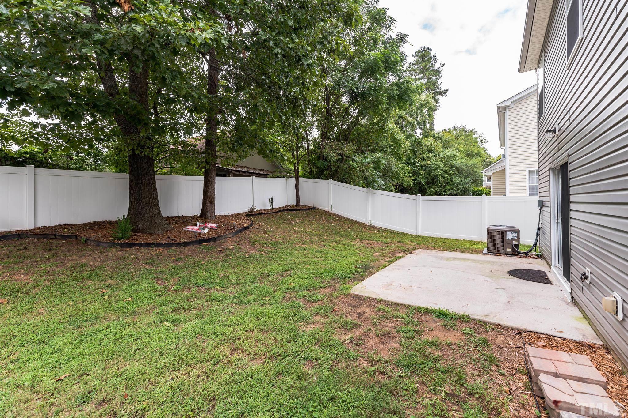 2824 Roundleaf Court Raleigh, NC 27604 - Photo 22 of 35 a view of backyard with green space