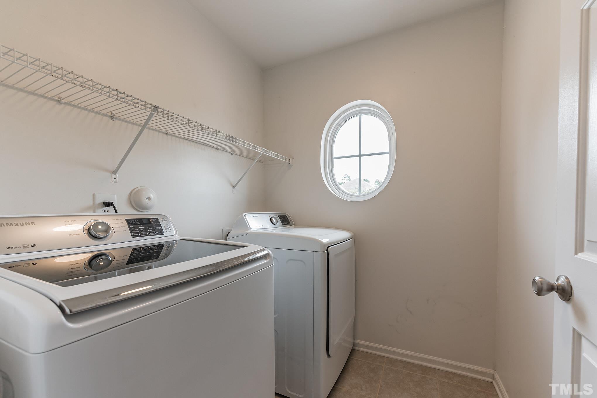 2824 Roundleaf Court Raleigh, NC 27604 - Photo 25 of 35 a utility room with dryer and washer