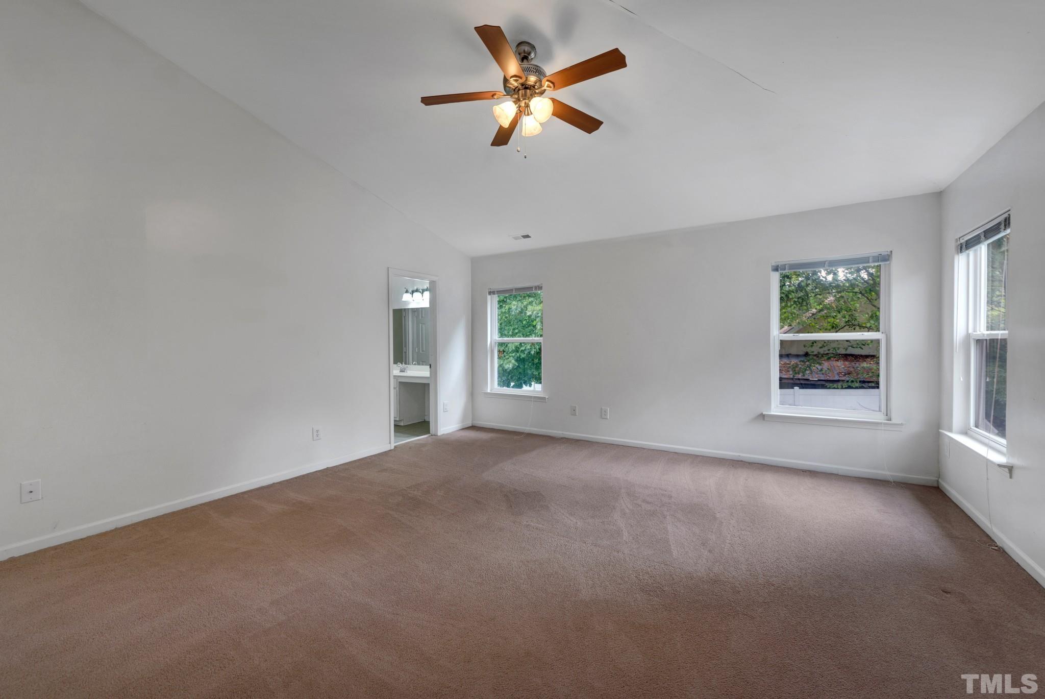 2824 Roundleaf Court Raleigh, NC 27604 - Photo 6 of 35 a view of a room with a window and a ceiling fan