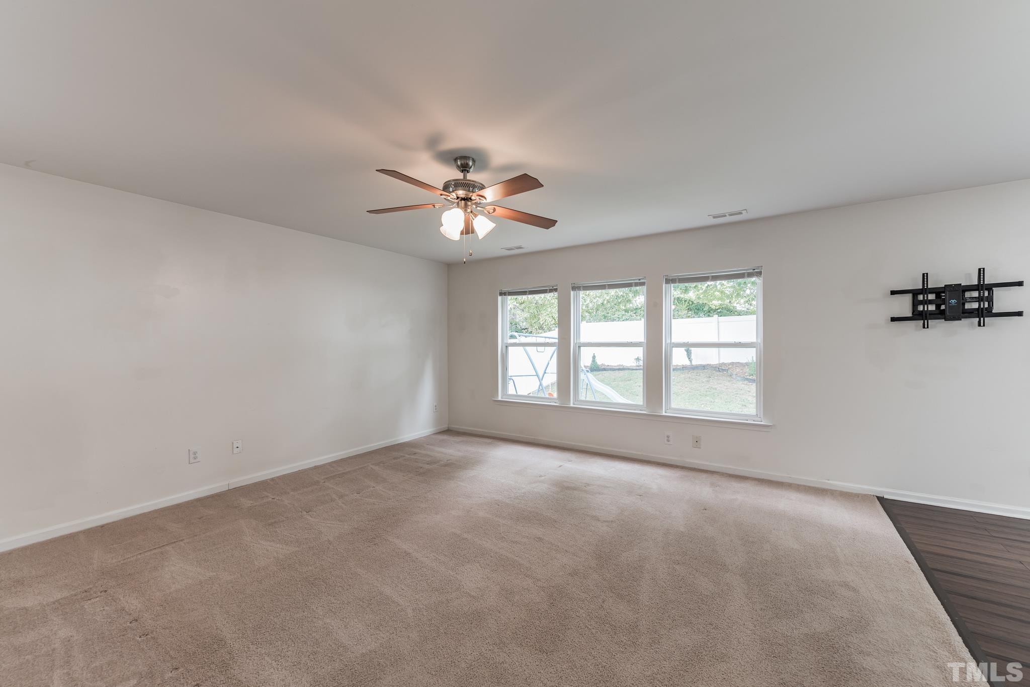 2824 Roundleaf Court Raleigh, NC 27604 - Photo 9 of 35 a view of an empty room with a window