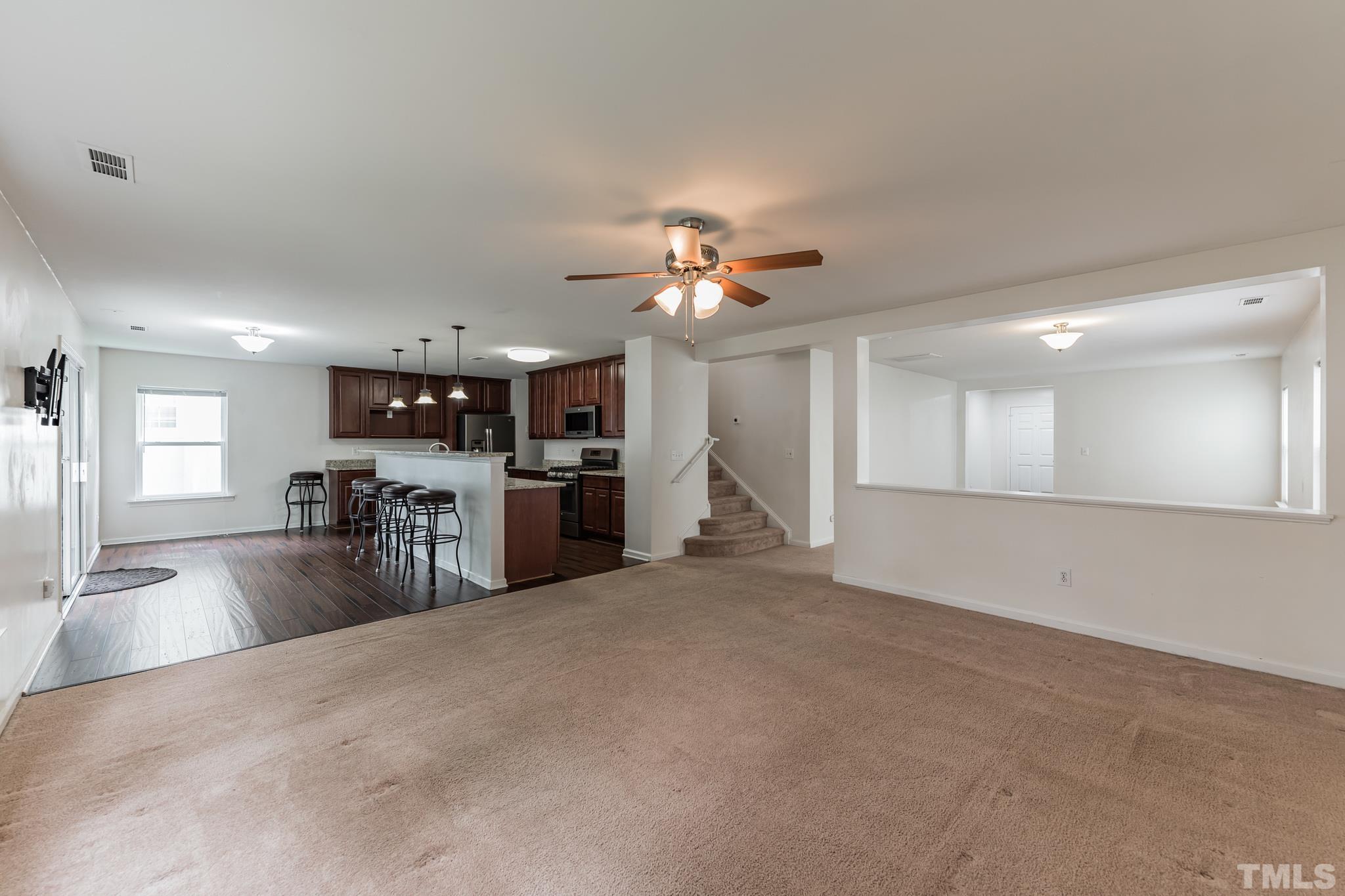 2824 Roundleaf Court Raleigh, NC 27604 - Photo 10 of 35 a view of a kitchen with a sink and a refrigerator