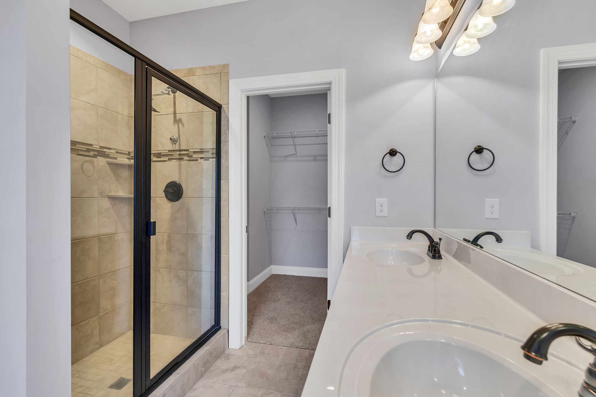 5502 Reflection Road Smyrna, TN 37167 - Photo 14 of 36 a bathroom with a tub and shower