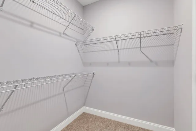 a view of a room with racks on the wall