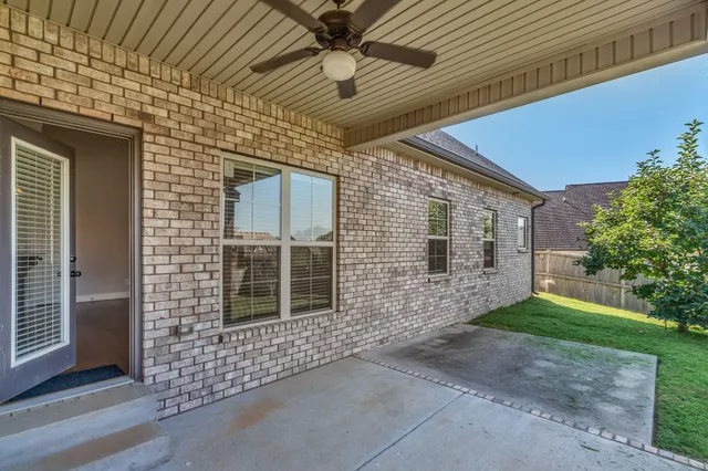 an aerial view of a house with a ocean view
