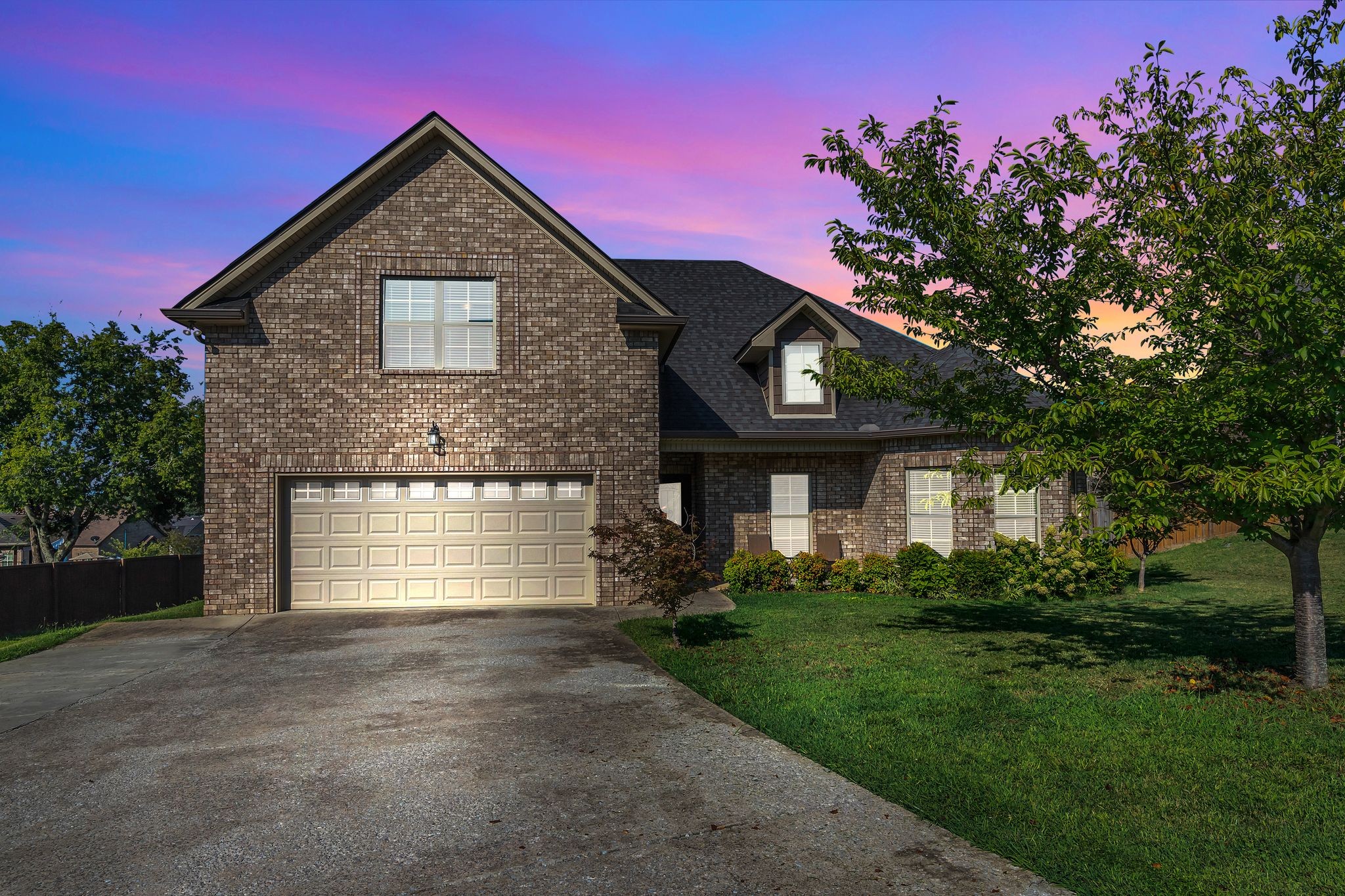 5502 Reflection Road Smyrna, TN 37167 - Photo 33 of 36 a front view of a house with a garden and plants