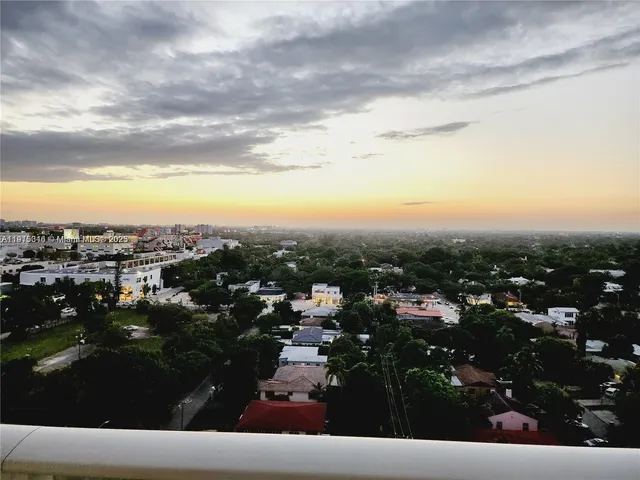 a view of a hallway with closet area