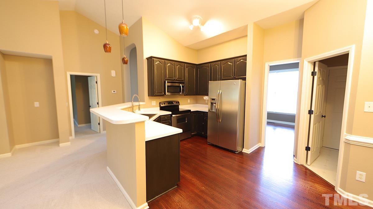 1203 Patterson Grove Road Apex, NC 27502 - Photo 4 of 11 Kitchen is open to family room and has breakfast area.