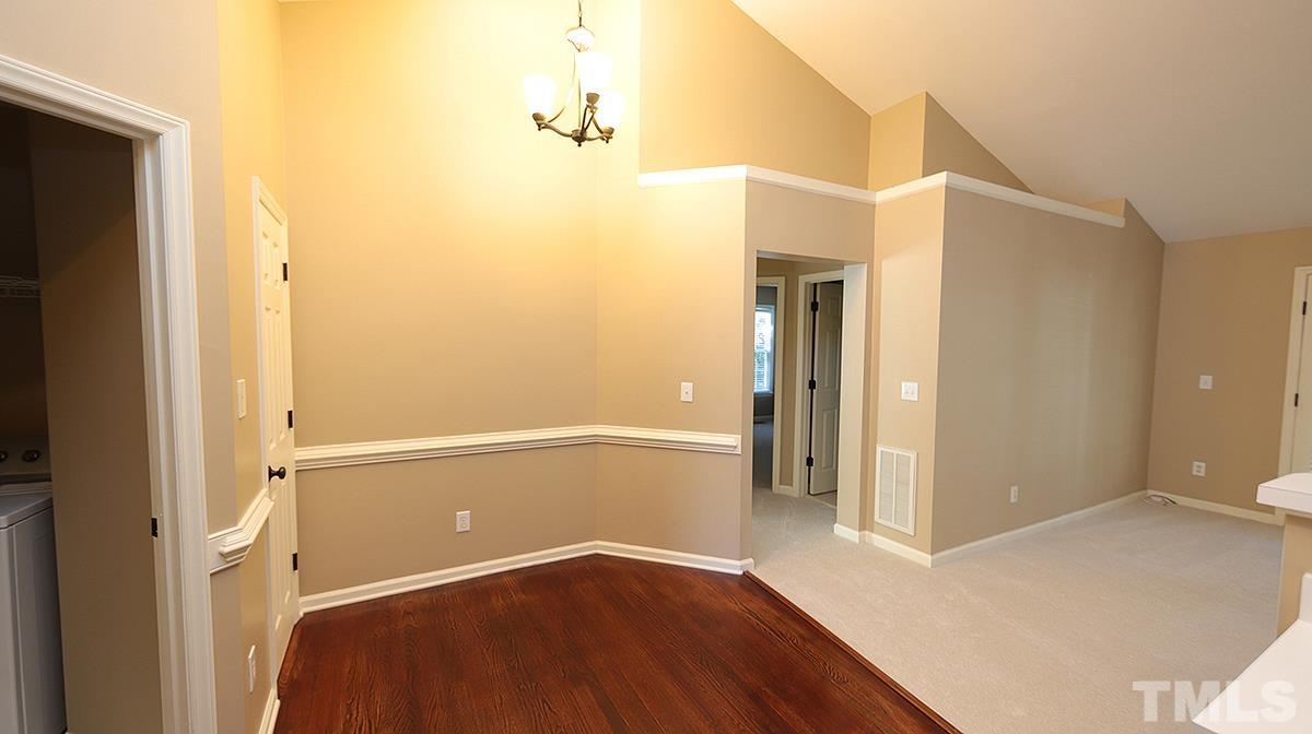 1203 Patterson Grove Road Apex, NC 27502 - Photo 5 of 11 Breakfast area is off kitchen and open to family room.