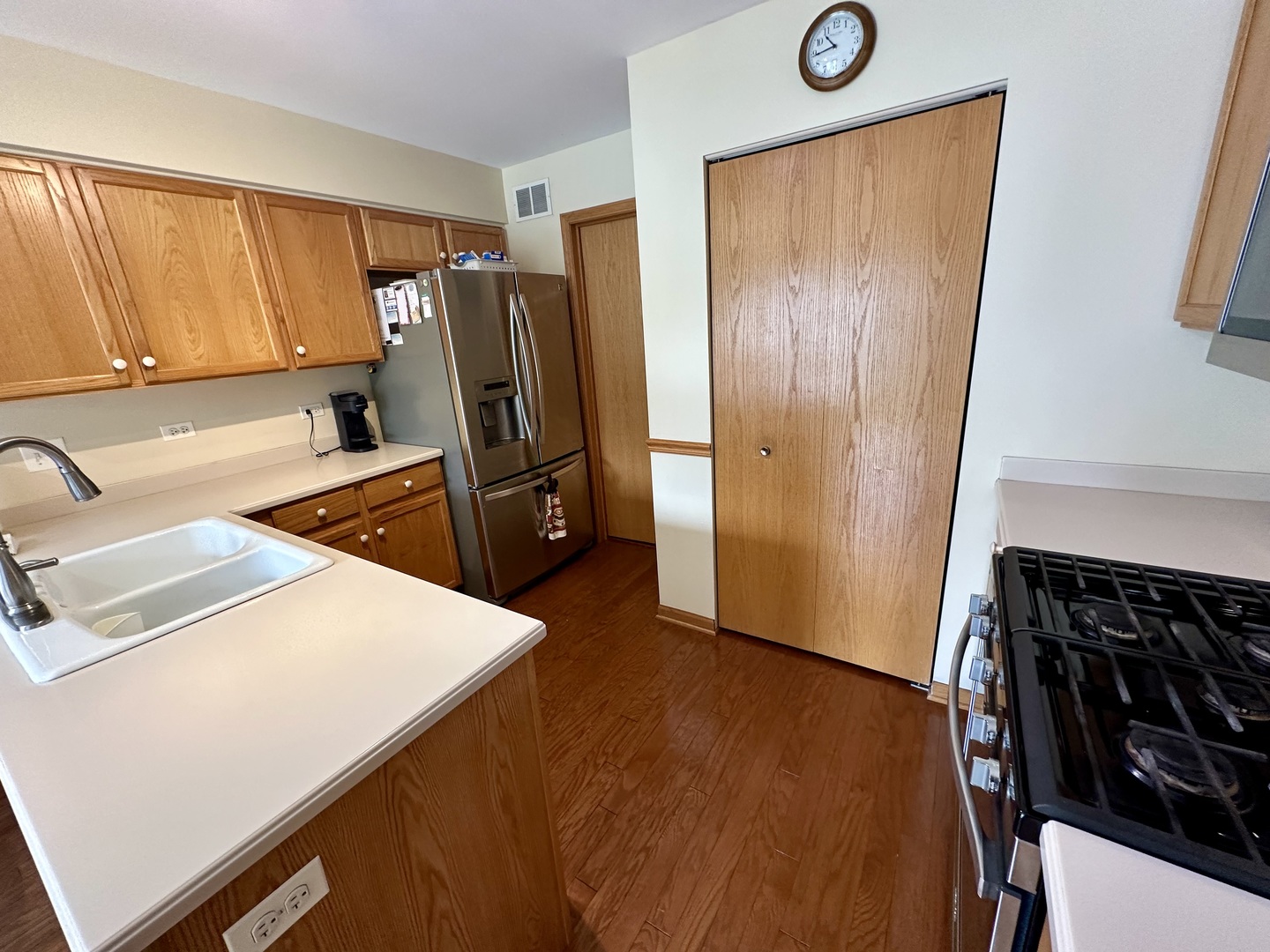 58 Rolling Oaks Road Sugar Grove, IL 60554 - Photo 8 of 23 a kitchen with stainless steel appliances a refrigerator and a stove top oven