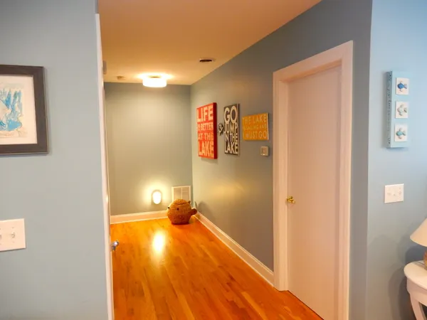 a bedroom with double bed and a large window