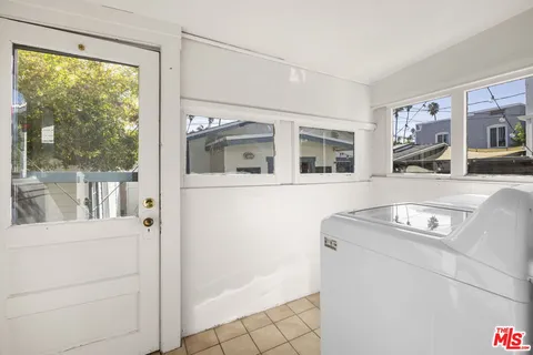 a living room with a couch and a table