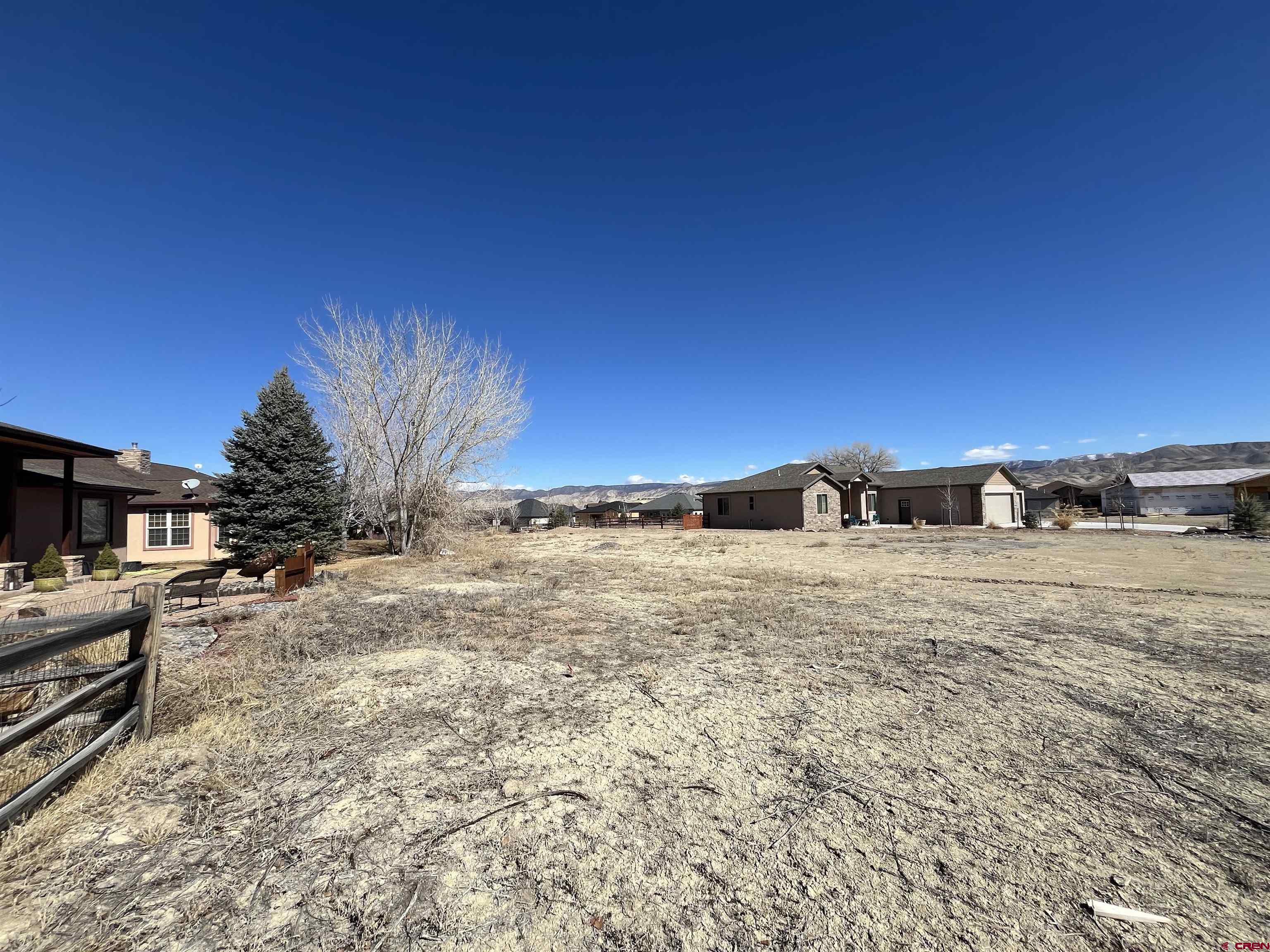 Tbd Mocha Court Montrose, CO 81401 - Photo 14 of 18 a view of a dry yard with trees