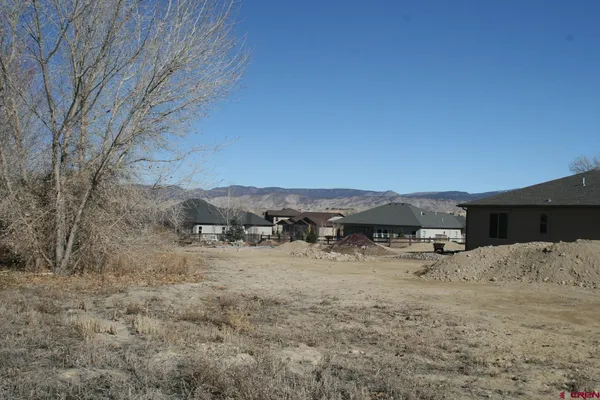 a view of a yard with a snow