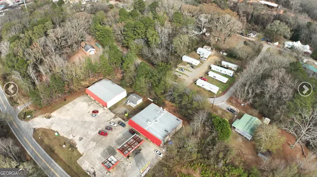 an aerial view of a house outdoor space and sitting space