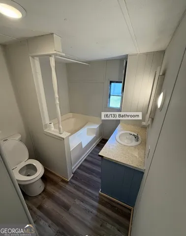 a bathroom with a sink and a toilet
