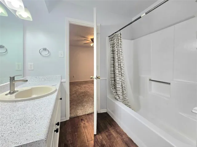 a bathroom with a sink and a tub