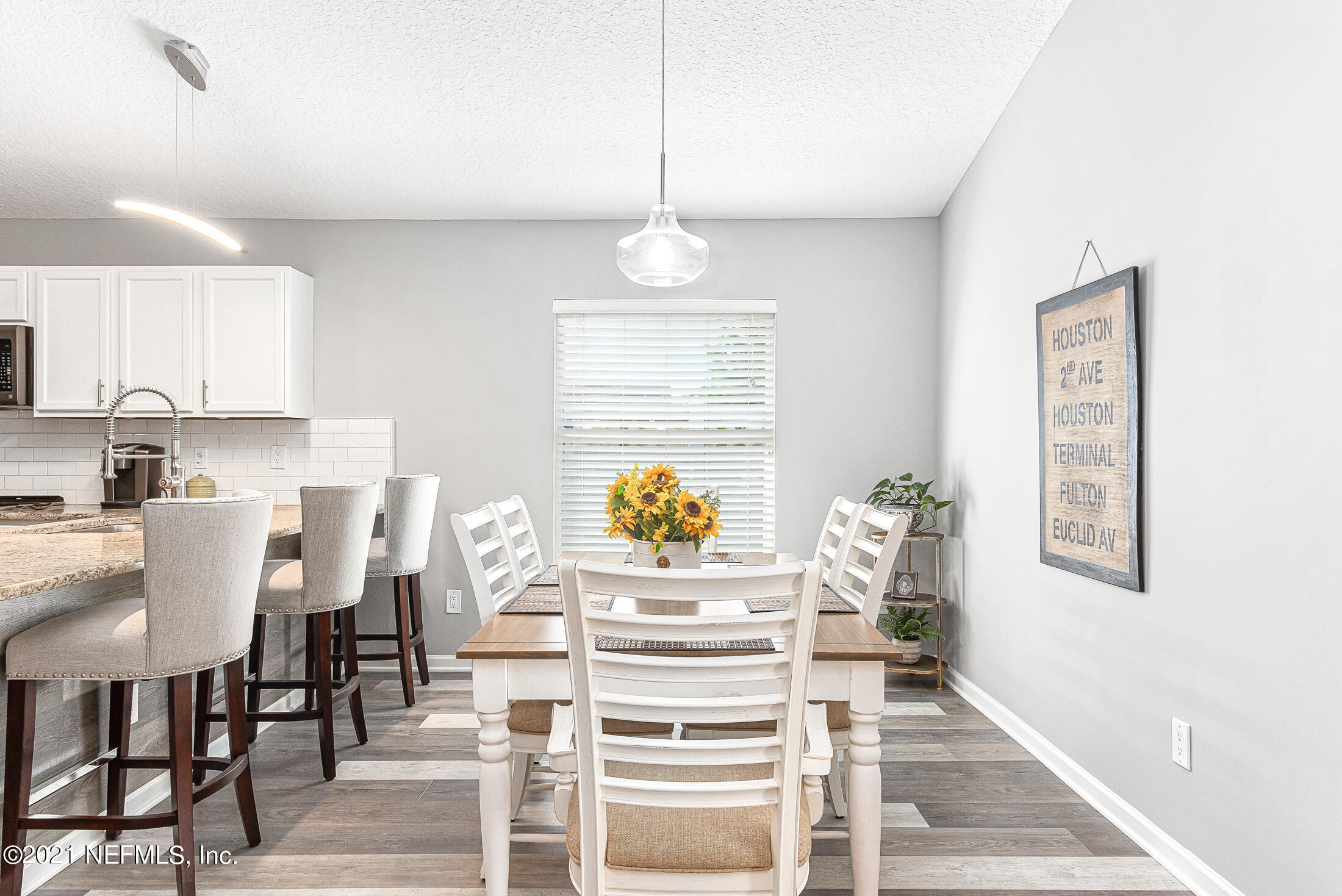 856 Crystal Spring Way St. Augustine, FL 32092 - Photo 18 of 54 a view of a dining room with furniture