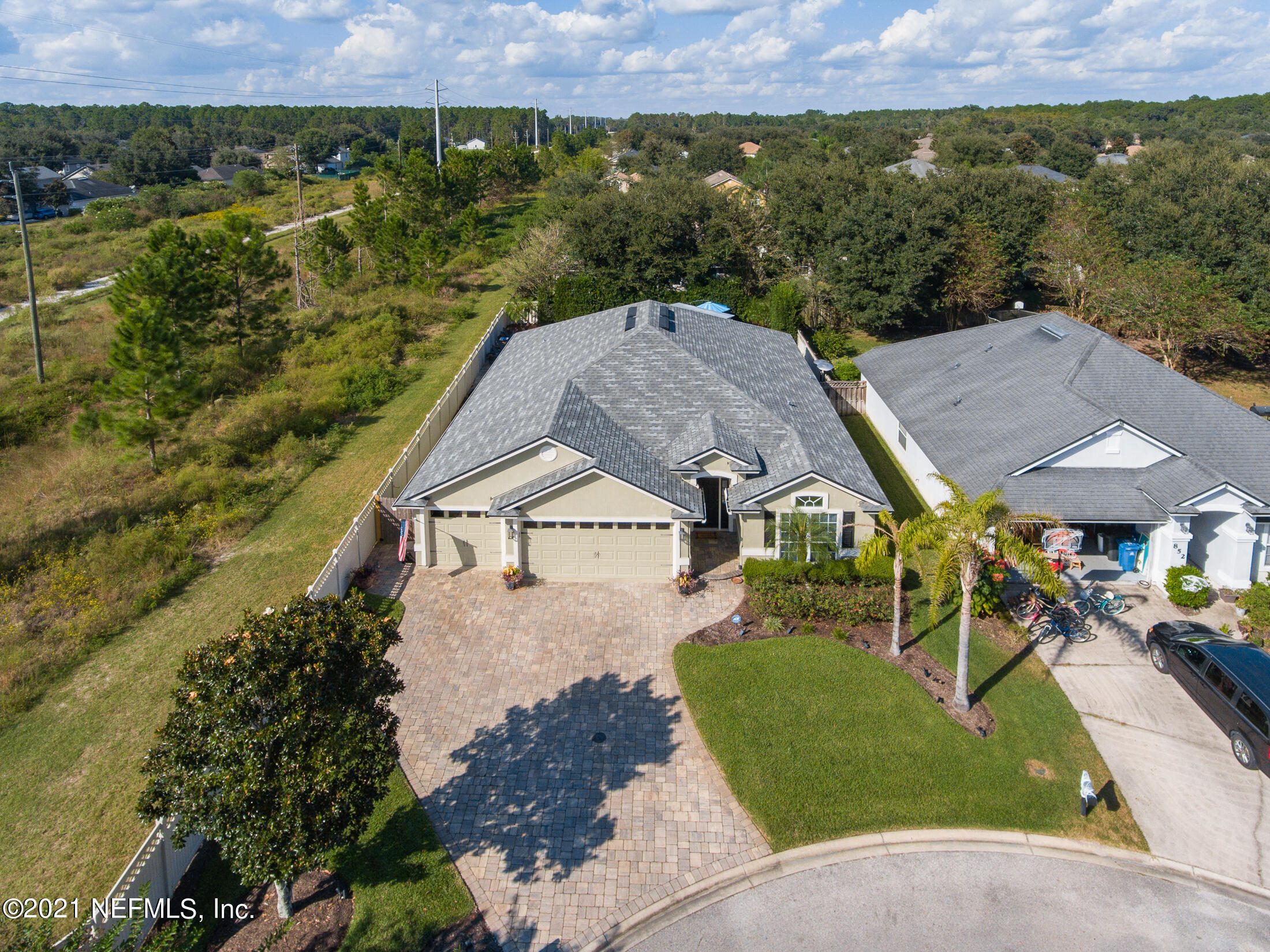 856 Crystal Spring Way St. Augustine, FL 32092 - Photo 2 of 54 an aerial view of a house with a yard