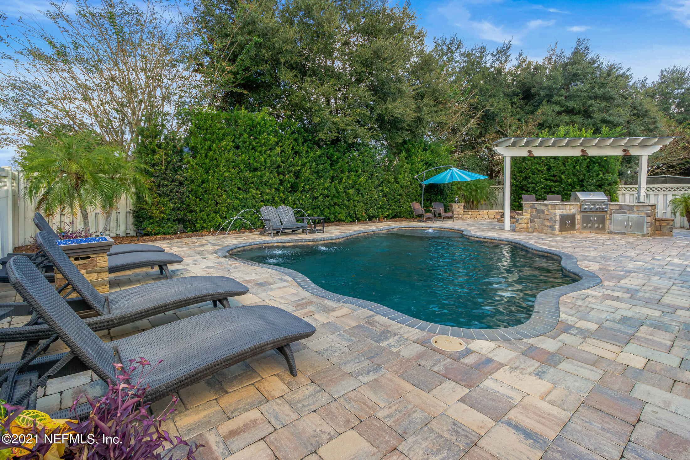 856 Crystal Spring Way St. Augustine, FL 32092 - Photo 39 of 54 a view of a backyard with sitting area
