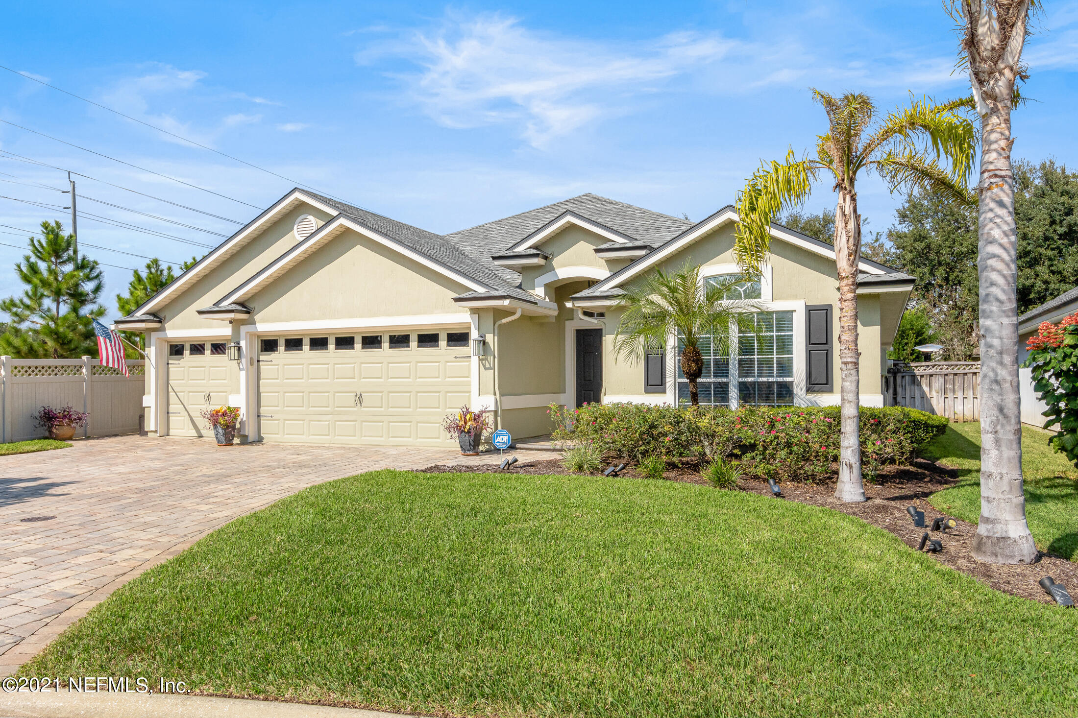 856 Crystal Spring Way St. Augustine, FL 32092 - Photo 45 of 54 a front view of a house with a yard and porch