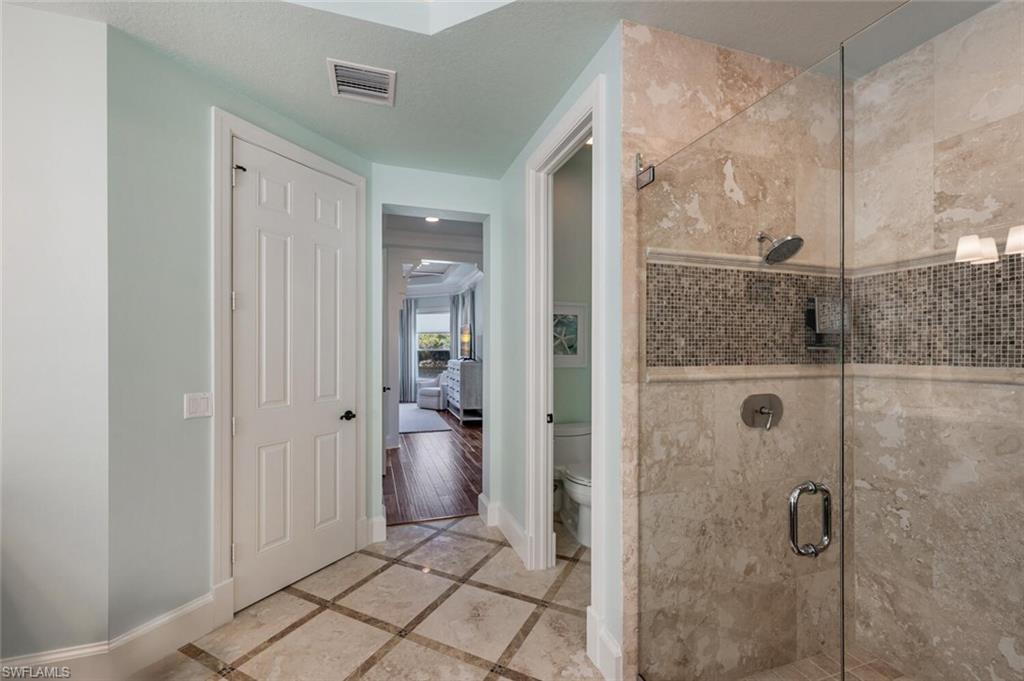3086 Aviamar Circle Naples, FL 34114 - Photo 26 of 50 a bathroom with a shower and a sink